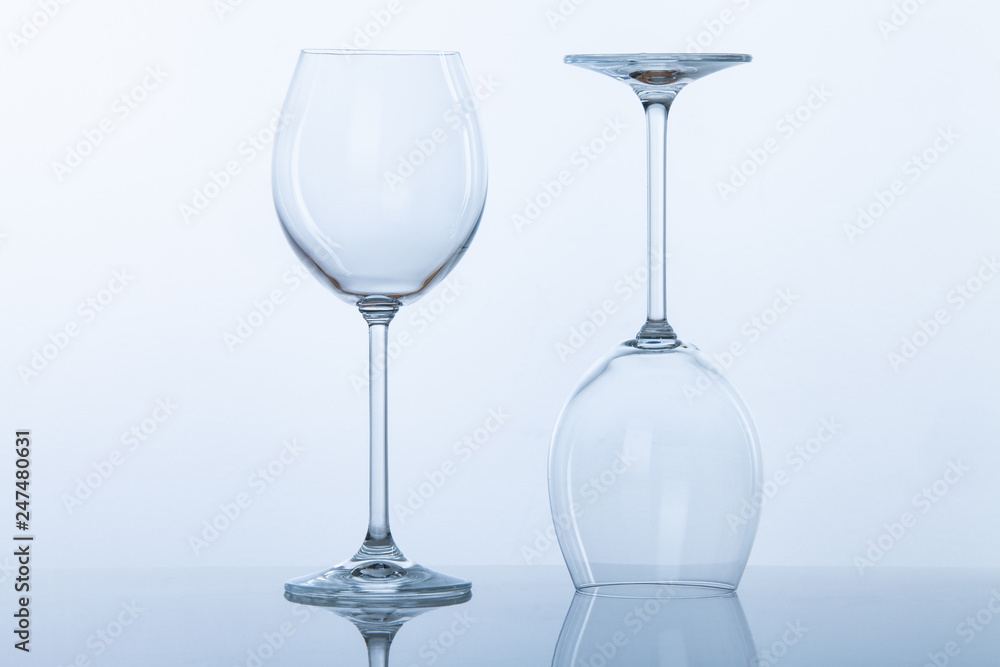 Obraz premium empty wine glasses on white background