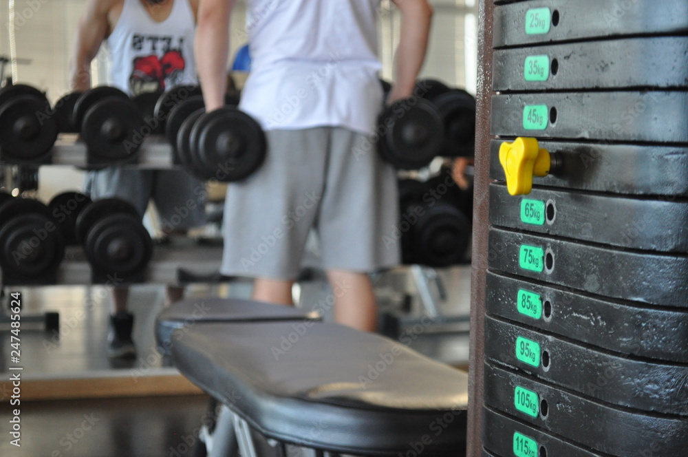 Fototapeta premium man working out in the gym