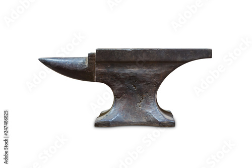 Old anvil on steel table