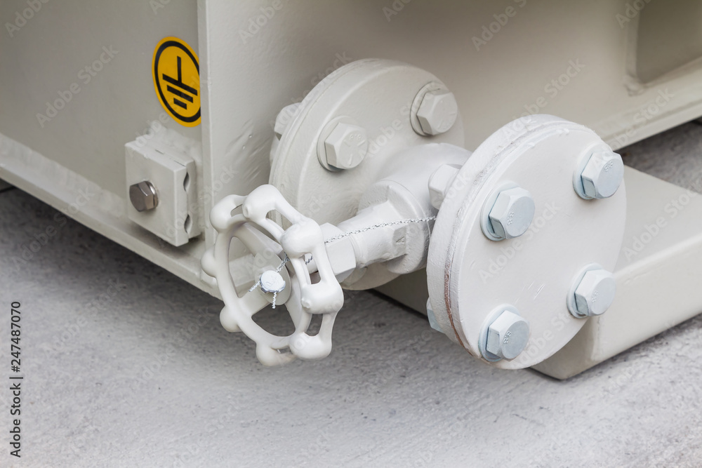 Oil drain valve of transformer Stock Photo | Adobe Stock