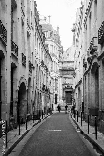 A narrow street in Marais, Paris, France © jonbilous