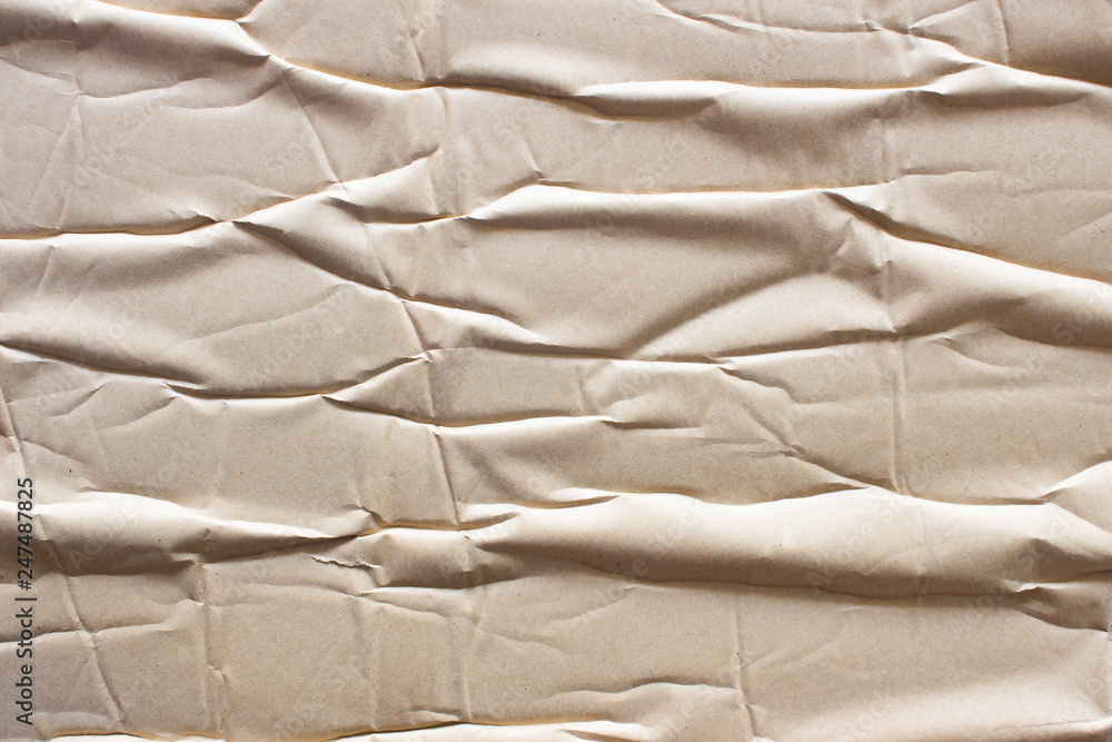 Texture crease of brown paper for template wallpaper. wrinkle of brown paper crumpled background. Texture crease of brown paper for template wallpaper. wrinkle of brown paper crumpled background.