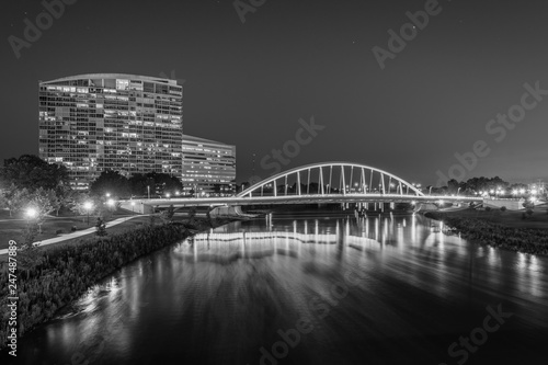 The Main Street Bridge and Scioto River at night  in Columbus  Ohio.