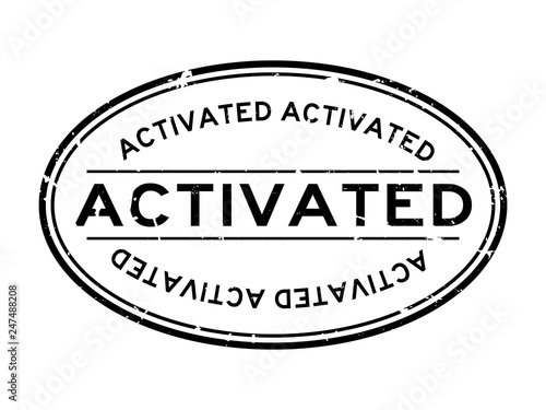 Grunge black activated word oval rubber seal stamp on white background
