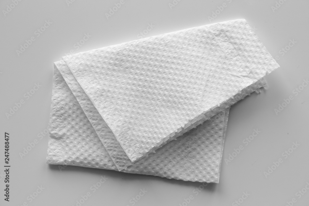 Fototapeta premium White tissues on gray background