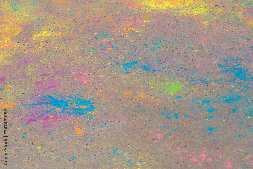 Background of colorful Holi powder on the ground