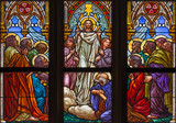 PRAGUE, CZECH REPUBLIC - OCTOBER 12, 2018: The Ascension of the Lord on the windowpane in church Bazilika svatého Petra a Pavla na Vyšehrade designed by František Sequens end. of 19. cent.