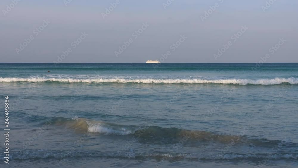 Wave on a sandy beach at south shore of Phuket island, Thailand. Wave on a sandy beach at south shore of Phuket island, Thailand.