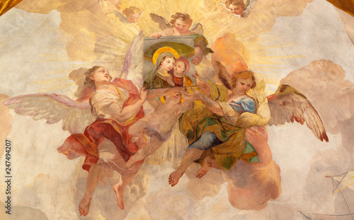 Photography PRAGUE, CZECH REPUBLIC - OCTOBER 18, 2018: The fresco angels with the image of Madonna in church Kostel Svaté Kateřiny Alexandrijské by Václav Vavřinec Reiner (1689 - 1743)