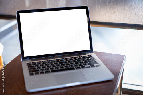 Fototapeta Naklejka Na Ścianę i Meble -  mock up Using laptop with blank screen computer modern