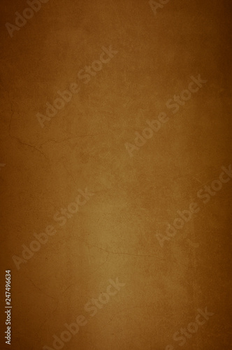 Background wall of aged textured old plaster brown.