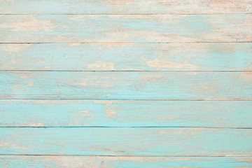 Vintage beach wood background - Old weathered wooden plank painted in turquoise blue pastel color.