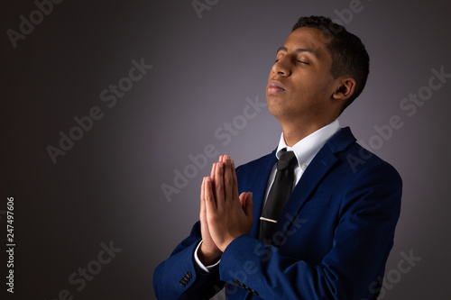 Canvas Print Hispanic Teenager Boy Seeking to Commune with God Via Prayer