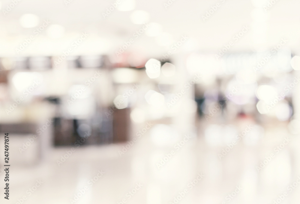 Fototapeta premium Blur inside shopping mall with bokeh light background