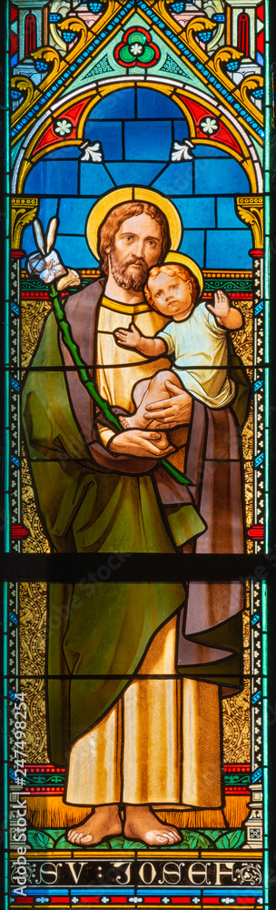 PRAGUE, CZECH REPUBLIC - OCTOBER 17, 2018: The St. Joseph on the stained glass in church Svatého Cyrila Metodeje designed by Josef Mocker (end of 19. cent.).