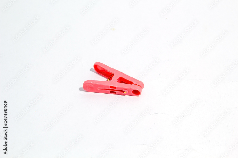 Colorful wood clothespins pegs on white background. Colorful wood clothespins pegs on white background.