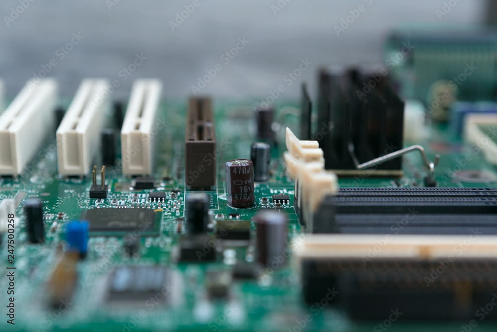 Shallow DOF View of a Computer Motherboard Chip Shallow DOF View of a Computer Motherboard Chip