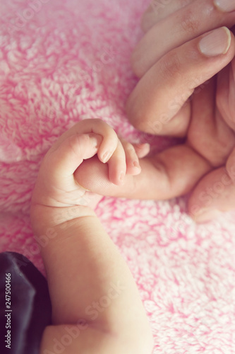 Sweet Newborn Baby Girl Hand Holding Daddy