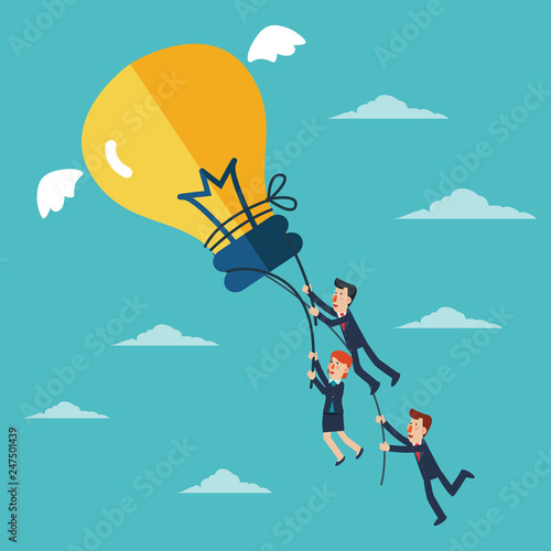 Business people try to catch flying idea