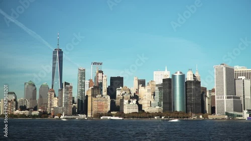 Slowmotion view on busy New York city from water.