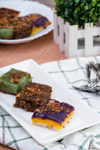 sapin sapin, biko, pandan sticky rice topped with caramelised coconut cream also called as latik photo