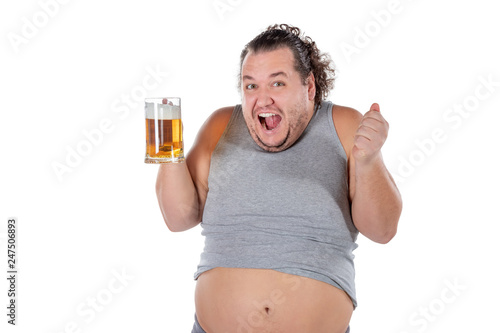 Funny fat man feeling happy and relaxed, holding fresh cold beer in his hands on white background