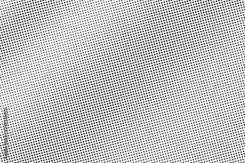 Black dots on white background. Abstract perforated surface. Small halftone vector texture. Subtle dotwork gradient