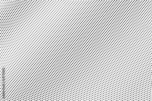 Black dots on white background. Grunge perforated surface. Faded halftone vector texture. Diagonal dotwork gradient