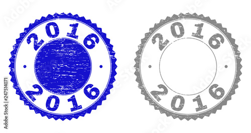 2016 stamp seals with grunge texture in blue and grey colors isolated on white background. Vector rubber imprint of 2016 title inside round rosette. Stamp seals with grunge textures.