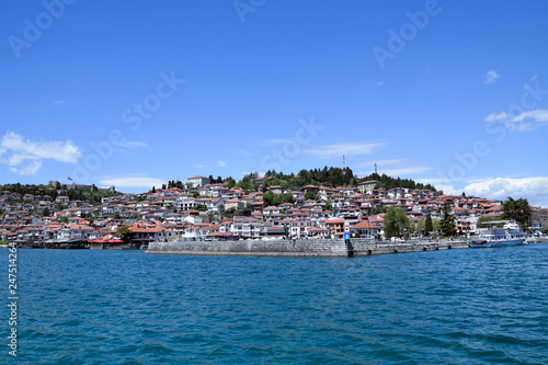 Harbor panorama of Ohrid town with Tsar Samuel fortress. Ochrid Lake with mountains background. Ohrid, Macedonia