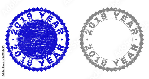 2019 YEAR stamp seals with distress texture in blue and grey colors isolated on white background. Vector rubber overlay of 2019 YEAR caption inside round rosette. Stamp seals with unclean styles.