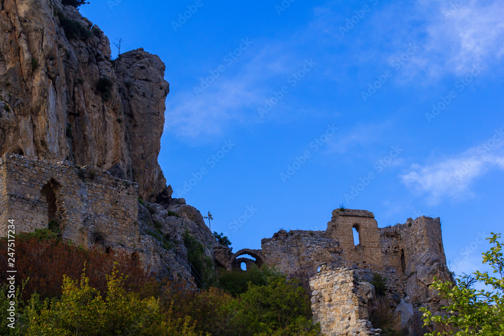 background bottom view of the rock with the ruins of the castle of St. Hilarion, in the vicinity of Kyrenia, Northern Cyprus
