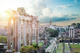 Roman ruins in Rome, Forum against cloudy sky. Rome, Italy