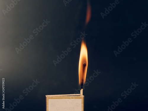 sulfur matches are burning on a black background