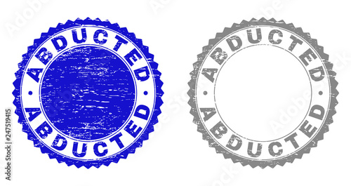 ABDUCTED stamp seals with grunge texture in blue and grey colors isolated on white background. Vector rubber imprint of ABDUCTED title inside round rosette. Stamp seals with unclean styles.