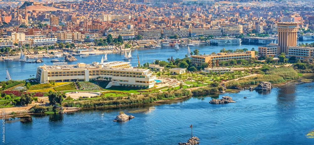 16/11/2018 Aswan, Egypt, view of the panorama of the city from the mountain of the west coast of the Nile on a sunny day