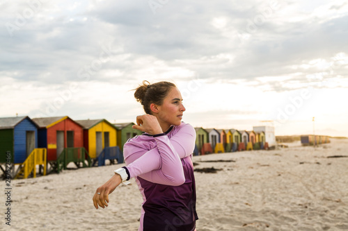 Female jogger stretching