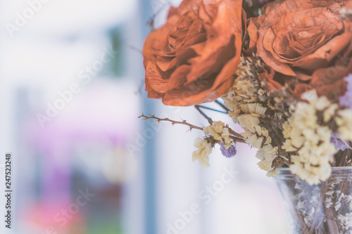 Selective focus of beautiful colorful flowers with summer bokeh background.vintage color style.