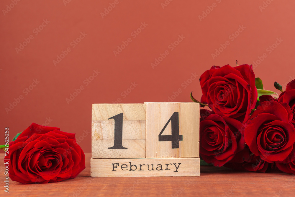 Fototapeta premium February 14 on calendar and decorations for Valentine's Day.