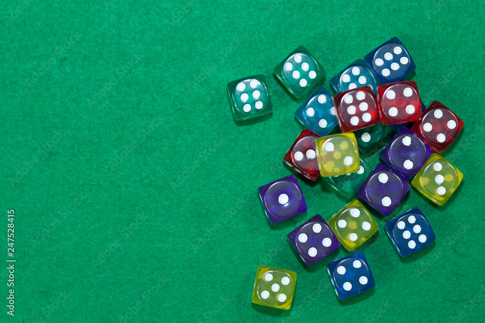 Different dices on green background. Different dices on green background.