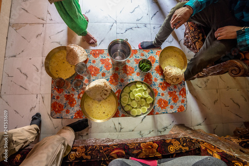 Indian Cuisine Kachi Kadhi with Chapati, It is Popular in Rajasthan, Uttar Pradesh and Madhya Pradesh photo