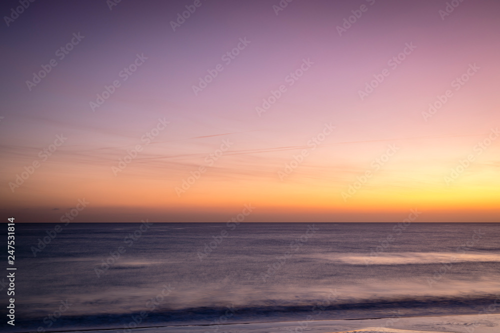 golden and pink skies over the mediterranean sea near valencia