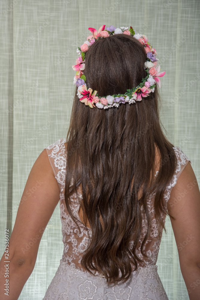 Naklejka premium Wedding dress detail. ,hairstyle,flower crown