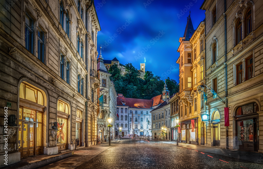 View of the street Stritarjeva, evening city and Ljubljana's castle.  Ljubljana, capital of Slovenia.