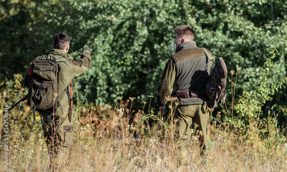 Army forces. Camouflage. Friendship of men hunters. Hunting skills and weapon equipment. How turn hunting into hobby. Military uniform fashion. Hunter with shotgun gun on hunt Army forces. Camouflage. Friendship of men hunters. Hunting skills and weapon equipment. How turn hunting into hobby. Military uniform fashion. Hunter with shotgun gun on hunt