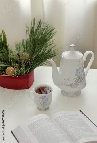 Wallpaper Mural Delicate kettle and mug on a light background on the table Torontodigital.ca