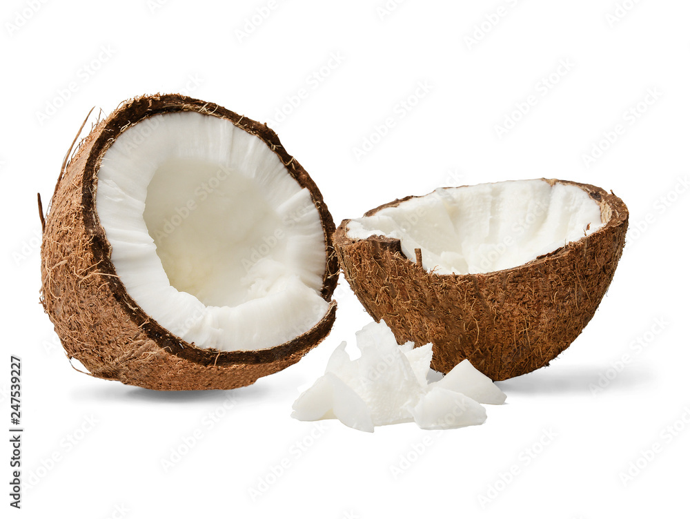 Two halves and pulp of chopped coconut. Close-up. White isolated background. Good detail Two halves and pulp of chopped coconut. Close-up. White isolated background. Good detail