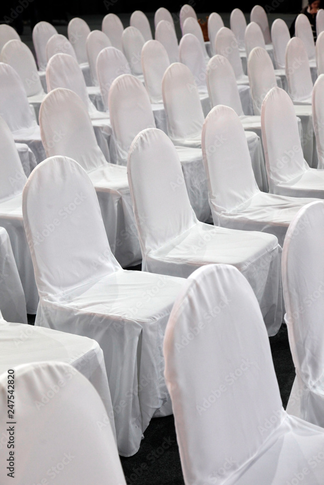 Fototapeta premium Rows of white chairs