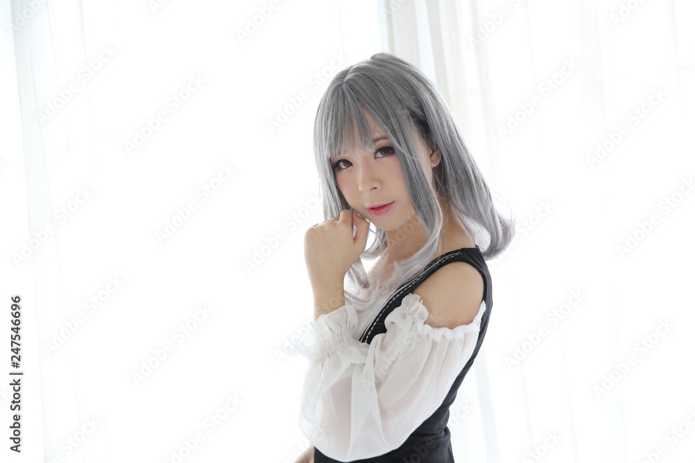 Portrait young asian woman with fashion dress in white tone room Portrait young asian woman with fashion dress in white tone room