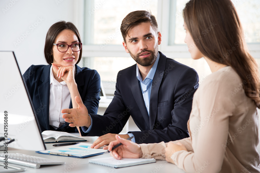 Businesspeople discuss a new project Businesspeople discuss a new project